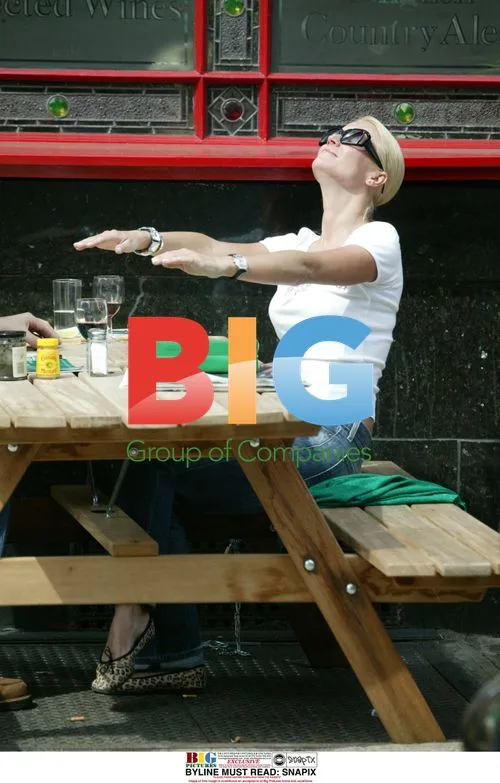 Denise Van Outen Tanning at Boyfriend's Pub