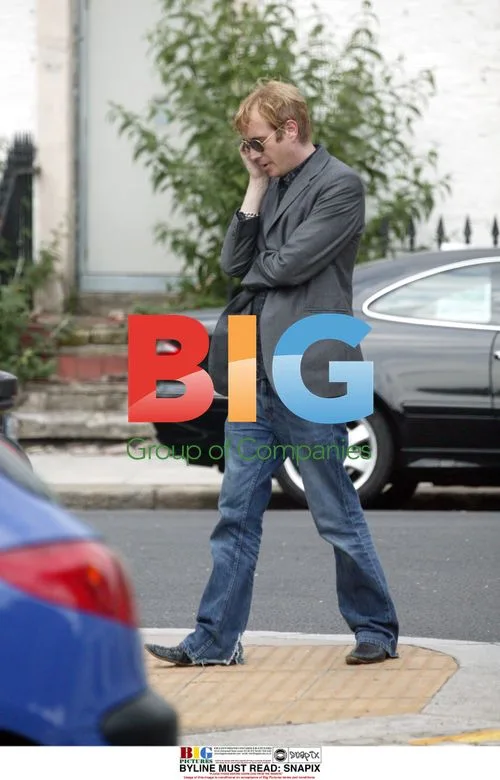 Rhys Ifans Talking on Phone in London