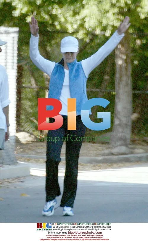 Jamie Lee Curtis and Christopher Guest Take Morning Walk