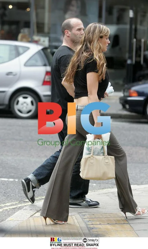Kelly Brook and Jason Statham shopping