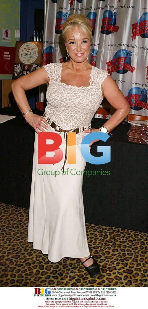 Tanya Tucker Poses for Book Promo