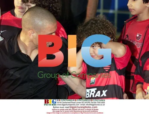 Ronaldo Nazario and son Ronald leave footprints