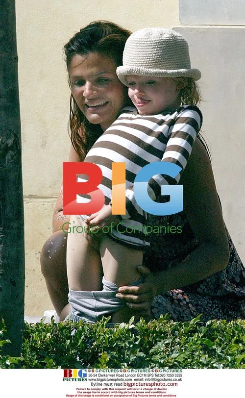 Helena Christensen and son shop at Grove Mall