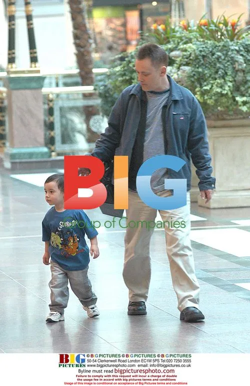 Terry Christian shops with son