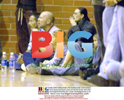 Bruce Willis and Demi Moore with daughters at volleyball match