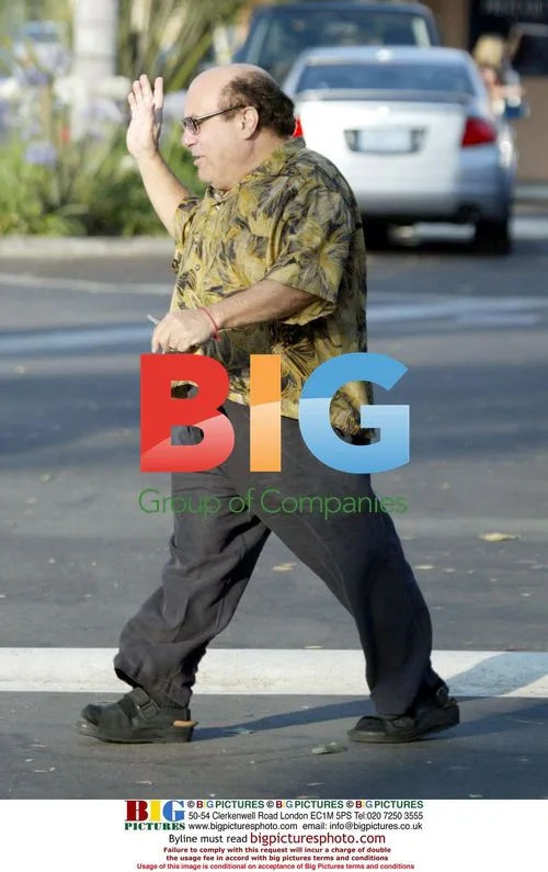 Danny DeVito Making Funny Faces with Family