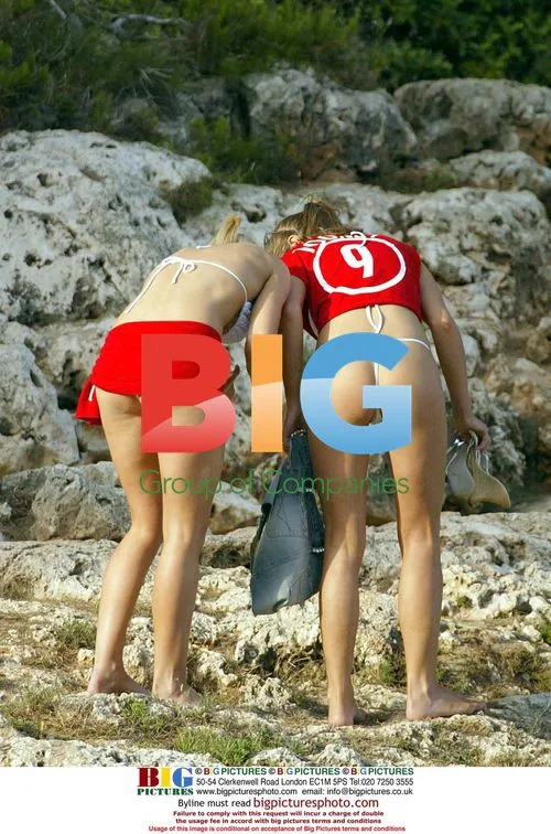 Models Tanya and Kayle having fun on beach