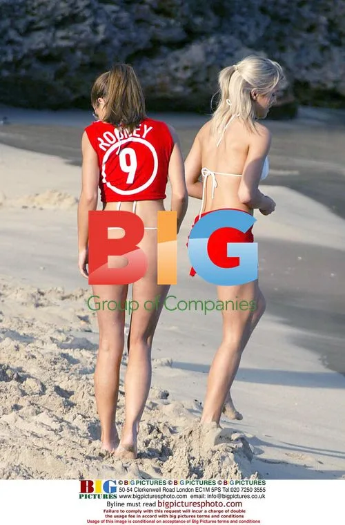 Models Tanya and Kayle play on the beach