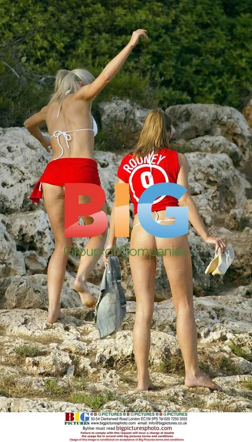 Models Tanya and Kayle playing on the beach