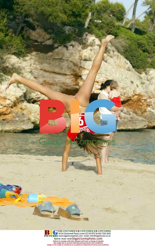 Models Tanya and Kayle Playing on Beach