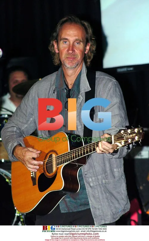 Mike Rutherford Performing at Birthday Party