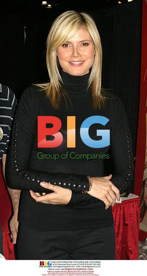 Heidi Klum promotes candy line at trade show