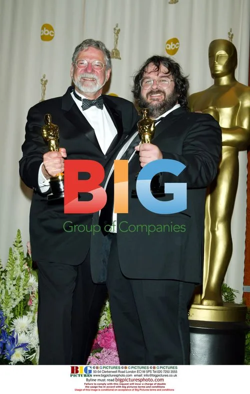 Peter Jackson and Barrie Osborne with Oscar