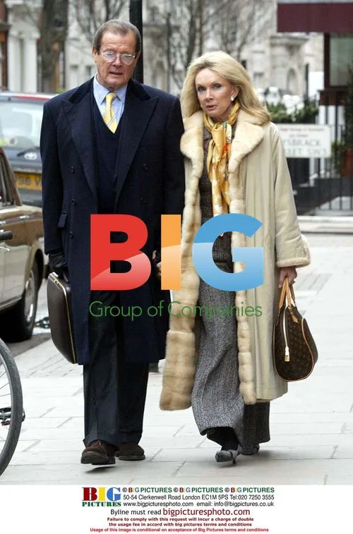 Sir Roger Moore and wife out in London