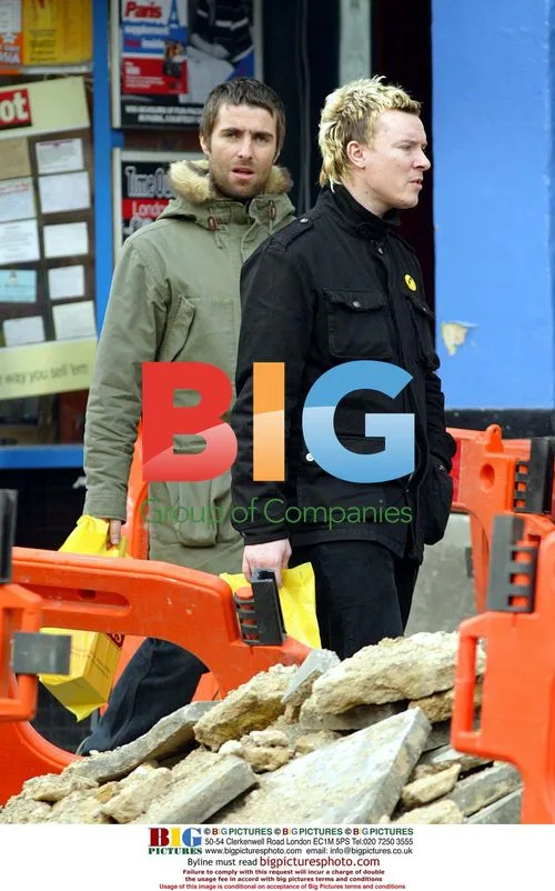 Liam Howlett and Liam Gallagher buy champagne