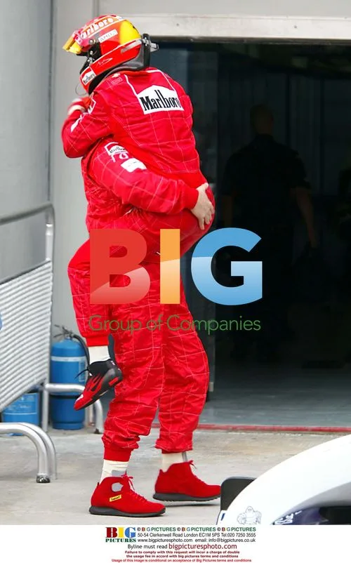 Michael Schumacher celebrates F1 win in Malaysia