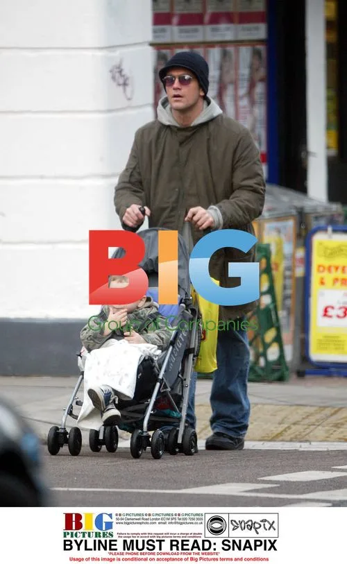 Scott Maslem with son Zak and partner in London