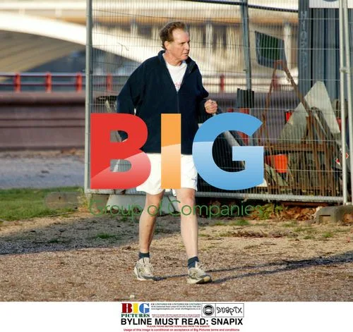 Politician Jonathan Aitken going for a run