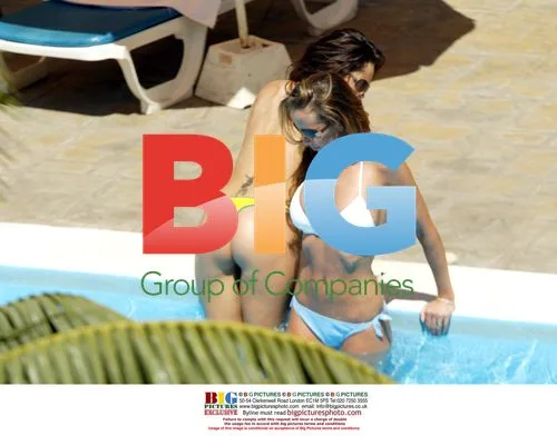 Models Tanning by Pool in Tenerife