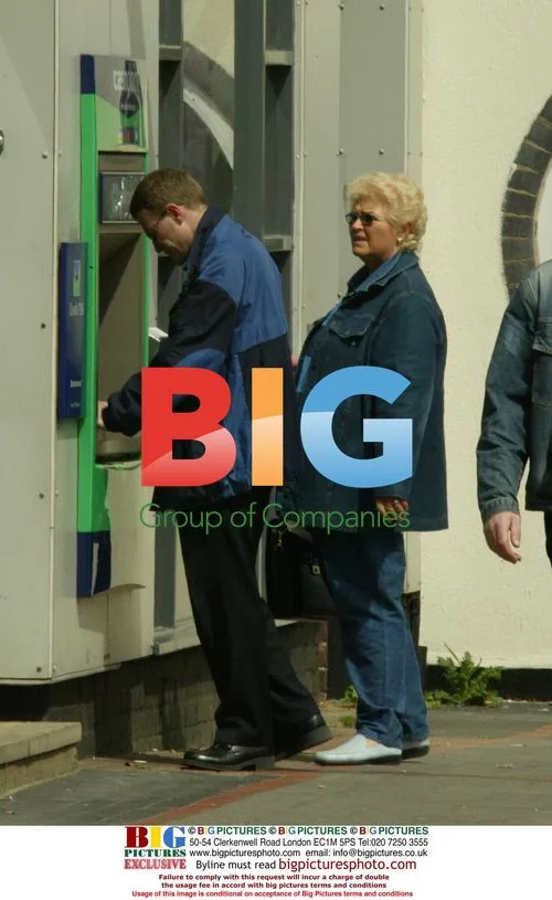 Pam St Clement struggles with cash machine