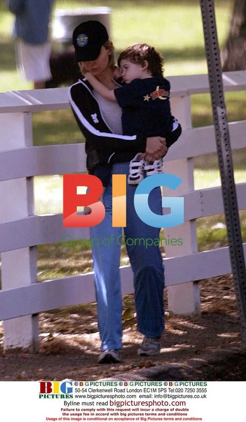 Calista Flockhart Carries Sick Son Liam