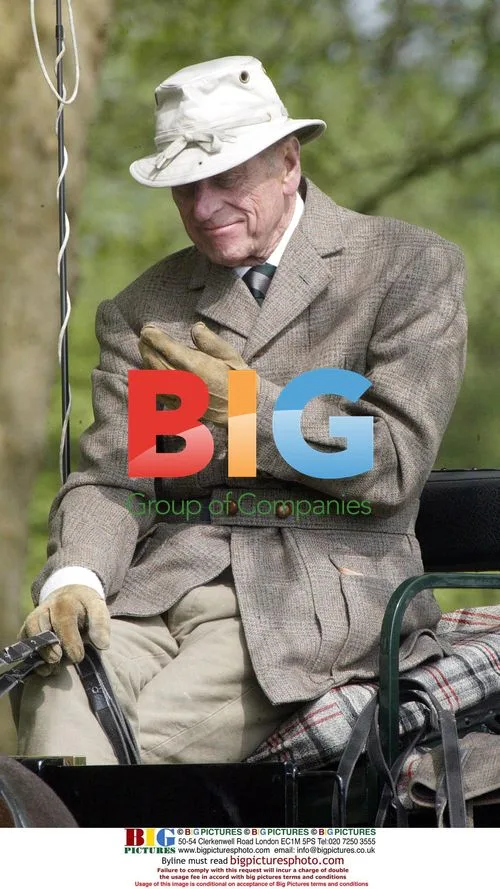 Queen Watches Phillip at Horse Show