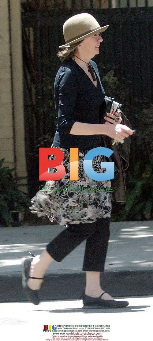 Diane Keaton rushes to car before parking ticket