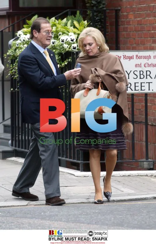 Roger Moore and wife out in London