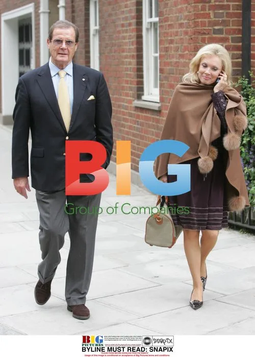 Roger Moore and wife Kiki out walking in London