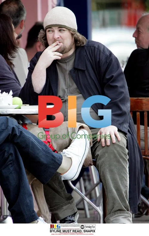 Paul Gallagher Enjoying Coffee in London