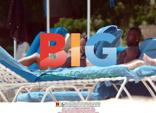 Footballer JIMMY FLOYD HASSELBAINK and Jamelia on Barbados beach
