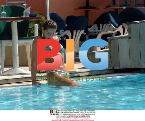 DJ Sassy Enjoying Pool Vacation