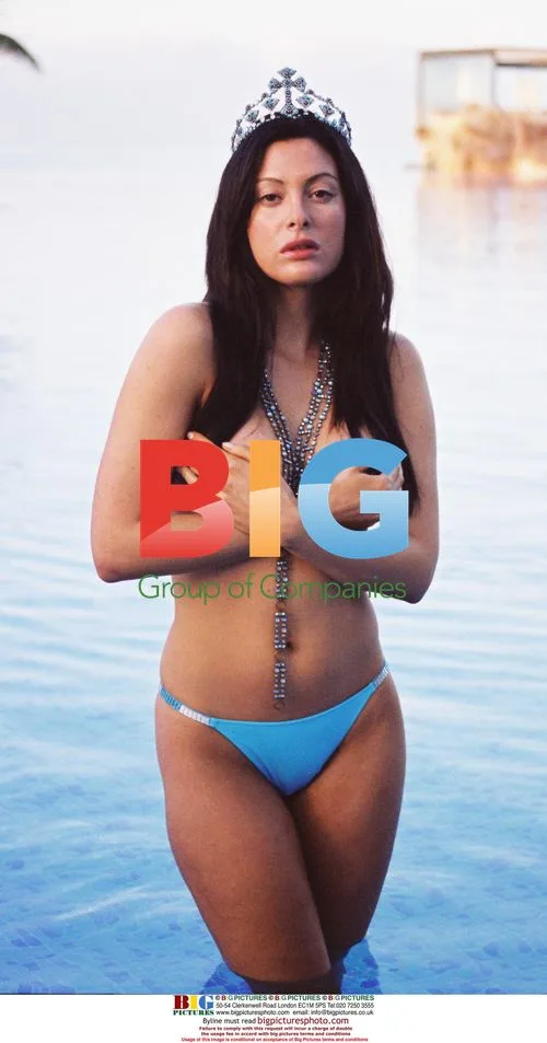 Model Catherine McQueen Posing in Bikini