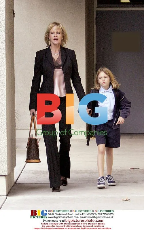 Melanie Griffith Picks Up Daughter From School