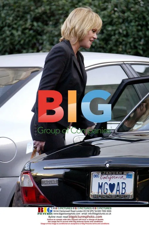 Melanie Griffith Picks Up Daughter From School