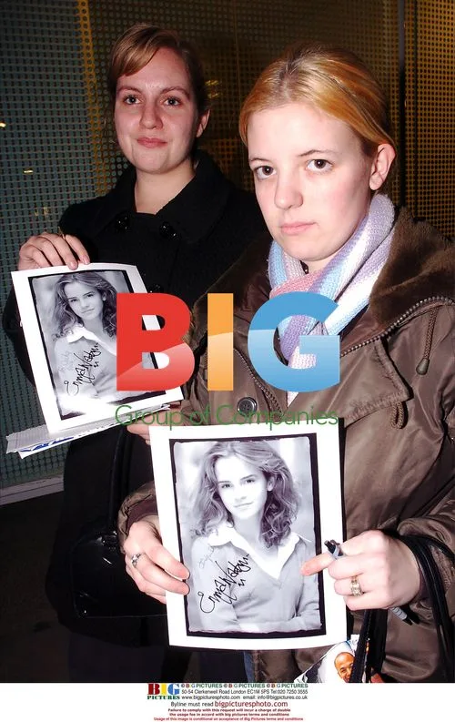 Emma Watson glum after Oxford St. lights switch-on