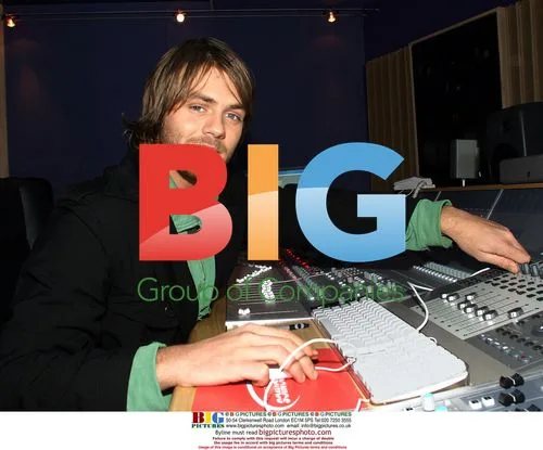 Singer Bryan McFadden at recording studio opening