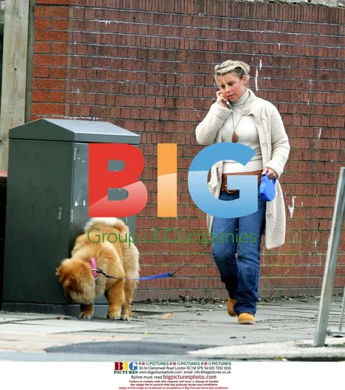 Coleen McLoughlin walks dog in Liverpool