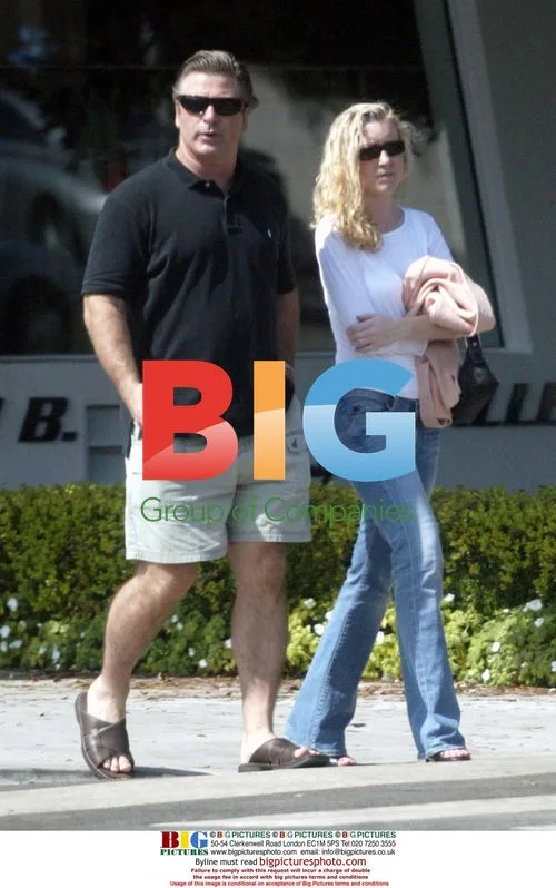 Alec Baldwin with Younger Blonde Woman