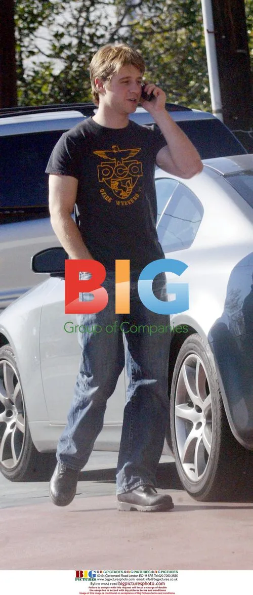 Benjamin Mackenzie pumping gas in LA