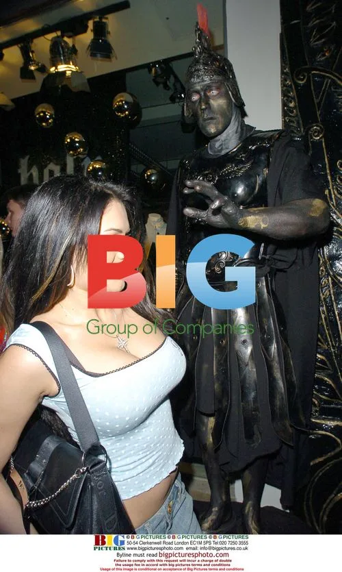 Glamour model meets restaurant mascot