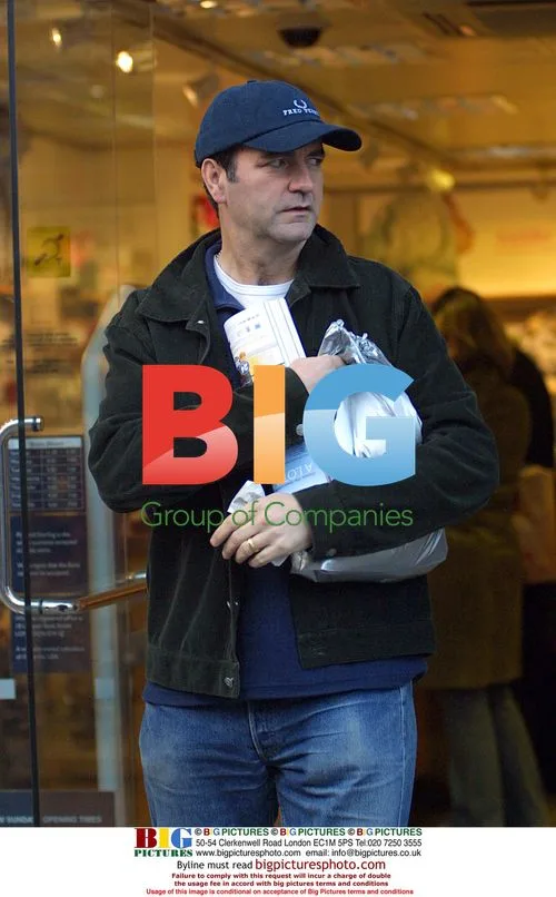 Actor Tony O'Callaghan shopping as 'The Bill' character