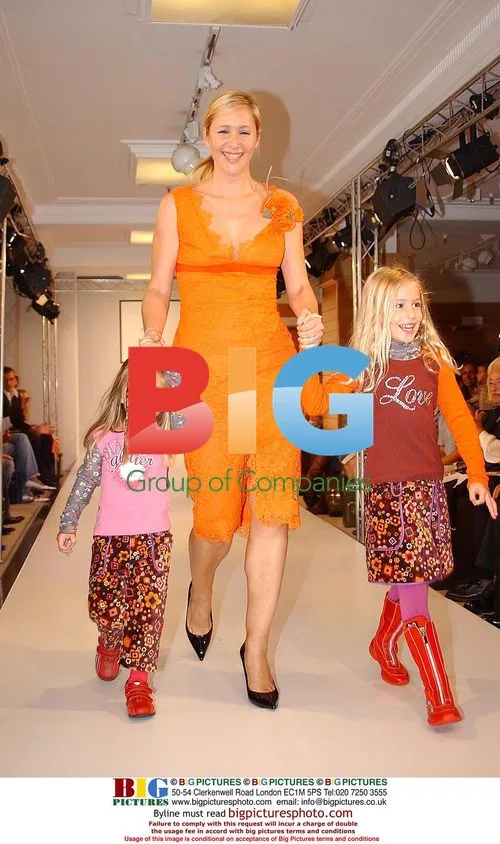 Tanya Bryer and daughters at Dolce & Gabbana show