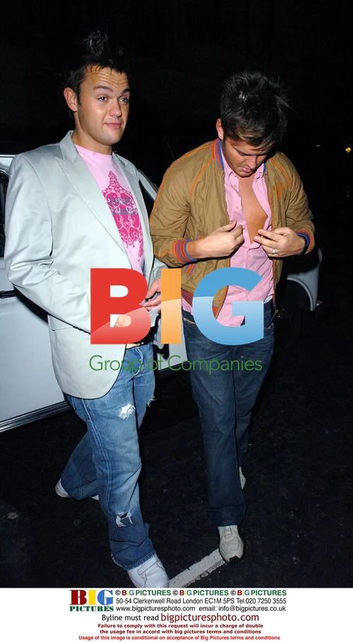 TV presenter Brian Downing and friend search for taxi fare
