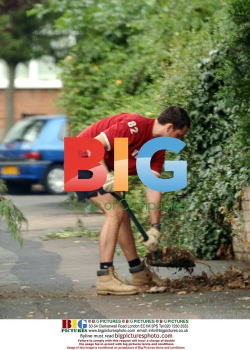 Trainee Firefighter Dave Morgan Clears Jessie Wallace's Garden