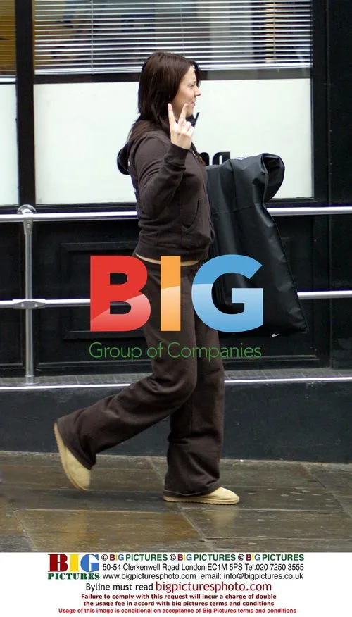 Mel C Picks Up Dry Cleaning