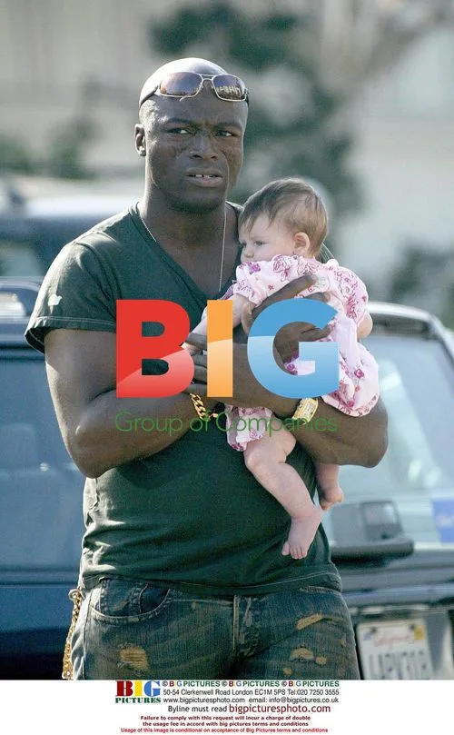 Heidi Klum and Seal with newborn daughter Leni