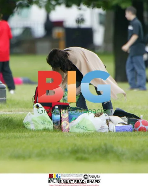 Mel C and boyfriend relax in park