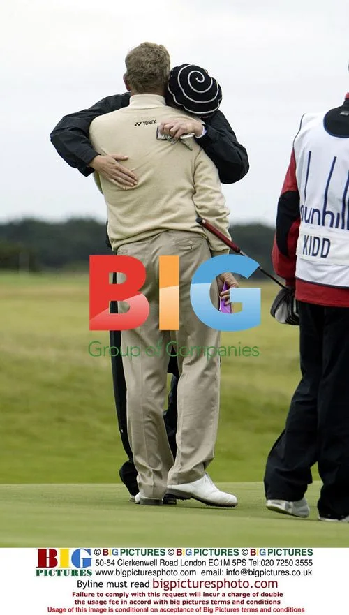 Colin Montgomery and Jodie Kidd Hug After Golf Round
