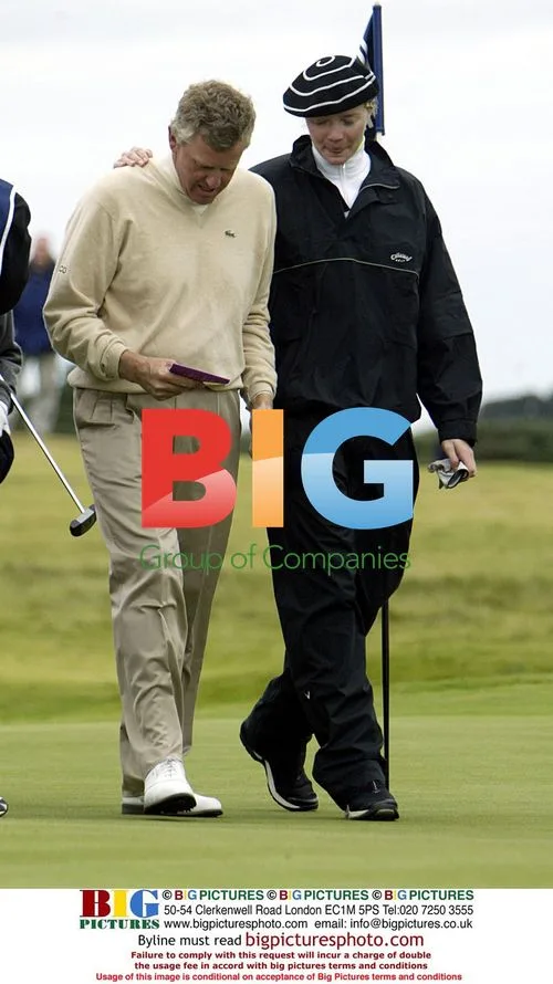 Colin Montgomery and Jodie Kidd golf hug